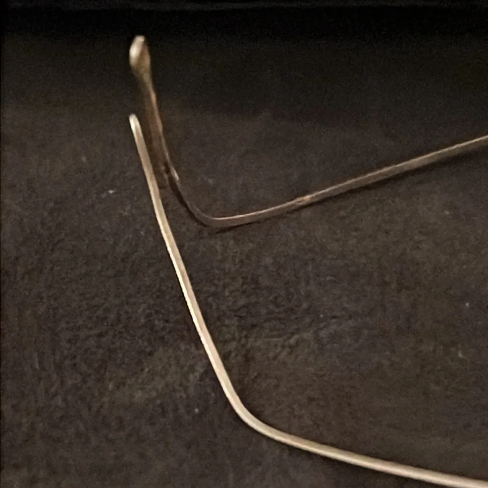 Antique metal wire rimmed eyeglasses and case